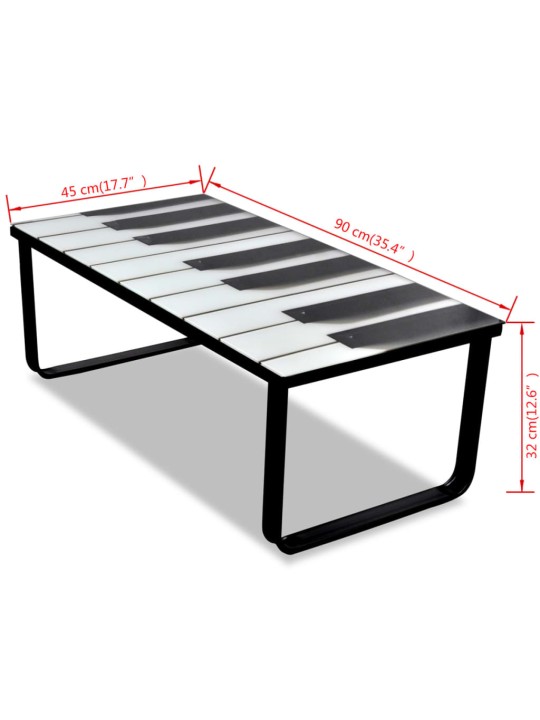 Sohvapöytä lasisella pöytälevyllä ja pianokuviolla