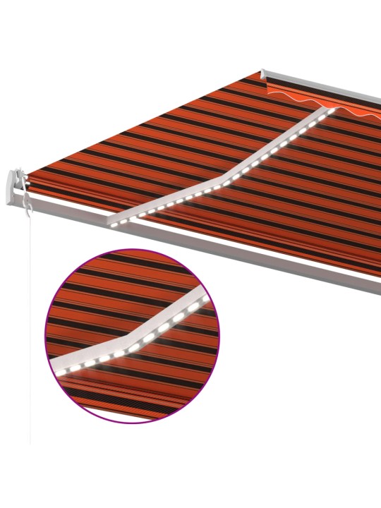 Käsin sisäänkelattava markiisi LEDillä 6x3 m oranssiruskea