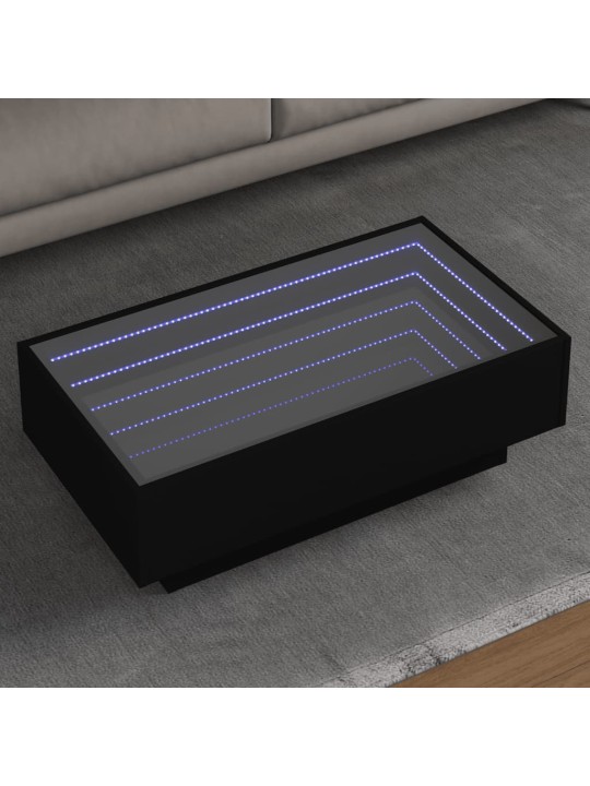 Sohvapöytä LED-valoilla musta 90x50x30 cm tekninen puu