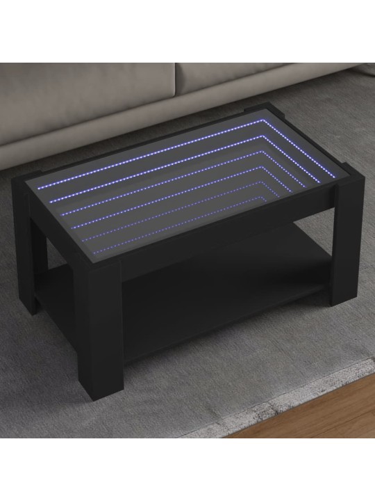 Sohvapöytä LED-valoilla musta 93x53x45 cm tekninen puu