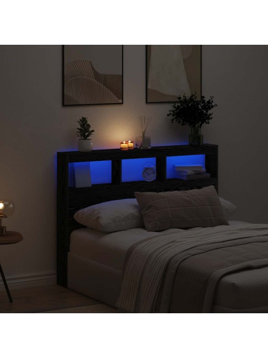 Sängynpäätykaappi led-valoilla musta tammi 140x17x102 cm